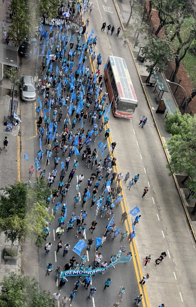Photo of a group of people walking in a parade