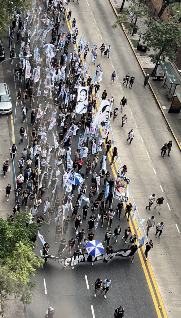 Photo of a group of people walking in a parade